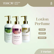 Three lotion perfume bottles with gold pumps, labeled Calme, Amour, Mignon, on light background.